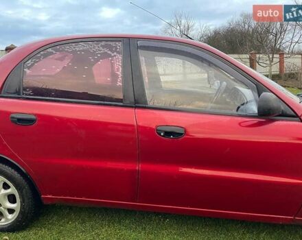 Червоний Деу Ланос, об'ємом двигуна 1.5 л та пробігом 320 тис. км за 1600 $, фото 4 на Automoto.ua