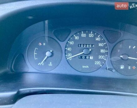 Красный Дэу Ланос, объемом двигателя 1.4 л и пробегом 103 тыс. км за 2700 $, фото 6 на Automoto.ua