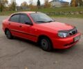Красный Дэу Ланос, объемом двигателя 1.5 л и пробегом 200 тыс. км за 2700 $, фото 1 на Automoto.ua