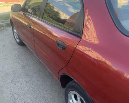 Красный Дэу Ланос, объемом двигателя 1.5 л и пробегом 144 тыс. км за 3000 $, фото 2 на Automoto.ua