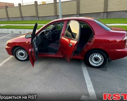 Красный Дэу Ланос, объемом двигателя 1.4 л и пробегом 150 тыс. км за 2700 $, фото 2 на Automoto.ua