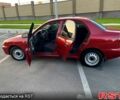 Красный Дэу Ланос, объемом двигателя 1.4 л и пробегом 150 тыс. км за 2700 $, фото 2 на Automoto.ua