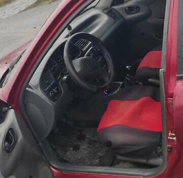 Красный Дэу Ланос, объемом двигателя 1.5 л и пробегом 270 тыс. км за 2200 $, фото 5 на Automoto.ua