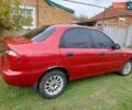 Деу Ланос 2008 у Богодухове на Automoto.ua Червоний Деу Ланос, об'ємом двигуна 1.5 л та пробігом 153 тис. км за 2600 $, фото 7 на Automoto.ua