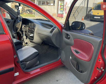 Красный Дэу Ланос, объемом двигателя 1.5 л и пробегом 148 тыс. км за 2600 $, фото 33 на Automoto.ua