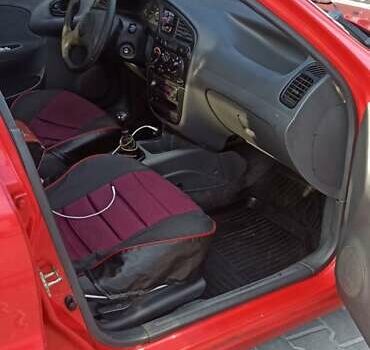 Красный Дэу Ланос, объемом двигателя 1.5 л и пробегом 437 тыс. км за 2150 $, фото 10 на Automoto.ua