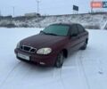 Красный Дэу Ланос, объемом двигателя 1.5 л и пробегом 250 тыс. км за 1600 $, фото 1 на Automoto.ua