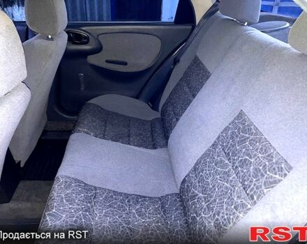 Красный Дэу Ланос, объемом двигателя 1.6 л и пробегом 155 тыс. км за 4000 $, фото 10 на Automoto.ua