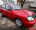 Красный Дэу Ланос, объемом двигателя 1.5 л и пробегом 280 тыс. км за 1750 $, фото 1 на Automoto.ua
