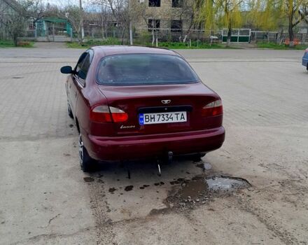 Красный Дэу Ланос, объемом двигателя 1.5 л и пробегом 200 тыс. км за 1950 $, фото 3 на Automoto.ua