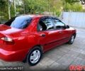 Красный Дэу Ланос, объемом двигателя 1.6 л и пробегом 155 тыс. км за 4000 $, фото 5 на Automoto.ua