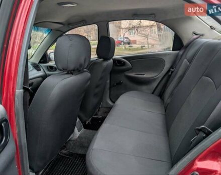 Красный Дэу Ланос, объемом двигателя 1.4 л и пробегом 156 тыс. км за 1950 $, фото 10 на Automoto.ua