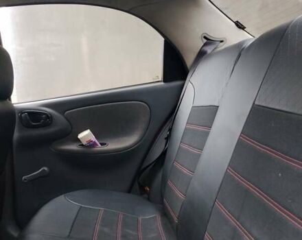 Красный Дэу Ланос, объемом двигателя 1.5 л и пробегом 330 тыс. км за 1400 $, фото 1 на Automoto.ua