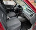 Красный Дэу Ланос, объемом двигателя 1.4 л и пробегом 156 тыс. км за 1950 $, фото 9 на Automoto.ua