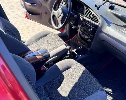 Красный Дэу Ланос, объемом двигателя 1.4 л и пробегом 112 тыс. км за 3000 $, фото 3 на Automoto.ua