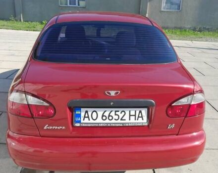 Красный Дэу Ланос, объемом двигателя 1.39 л и пробегом 77 тыс. км за 2700 $, фото 1 на Automoto.ua