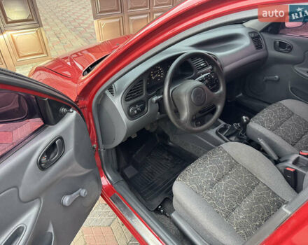 Красный Дэу Ланос, объемом двигателя 1.4 л и пробегом 44 тыс. км за 3300 $, фото 10 на Automoto.ua