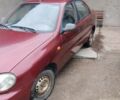 Красный Дэу Ланос, объемом двигателя 1.5 л и пробегом 330 тыс. км за 1400 $, фото 12 на Automoto.ua