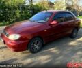 Красный Дэу Ланос, объемом двигателя 1.4 л и пробегом 126 тыс. км за 1500 $, фото 5 на Automoto.ua