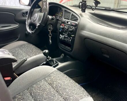 Красный Дэу Ланос, объемом двигателя 1.4 л и пробегом 129 тыс. км за 2200 $, фото 8 на Automoto.ua