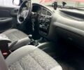 Красный Дэу Ланос, объемом двигателя 1.4 л и пробегом 129 тыс. км за 2200 $, фото 8 на Automoto.ua