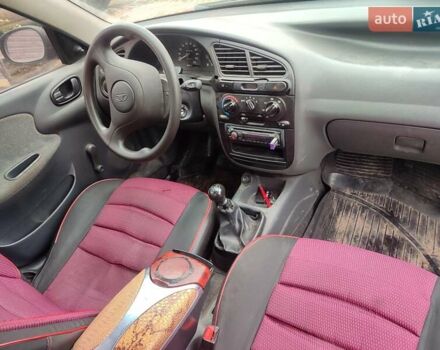 Красный Дэу Ланос, объемом двигателя 1.5 л и пробегом 197 тыс. км за 2400 $, фото 10 на Automoto.ua