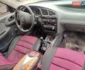 Красный Дэу Ланос, объемом двигателя 1.5 л и пробегом 197 тыс. км за 2400 $, фото 10 на Automoto.ua
