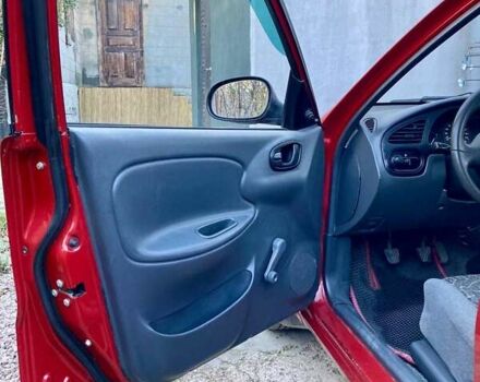 Красный Дэу Ланос, объемом двигателя 1.4 л и пробегом 103 тыс. км за 2700 $, фото 8 на Automoto.ua