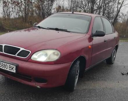 Красный Дэу Ланос, объемом двигателя 1.5 л и пробегом 270 тыс. км за 2200 $, фото 1 на Automoto.ua