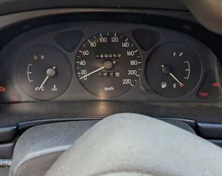 Красный Дэу Ланос, объемом двигателя 1.5 л и пробегом 180 тыс. км за 2000 $, фото 1 на Automoto.ua