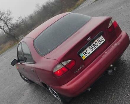 Красный Дэу Ланос, объемом двигателя 1.5 л и пробегом 270 тыс. км за 2200 $, фото 2 на Automoto.ua