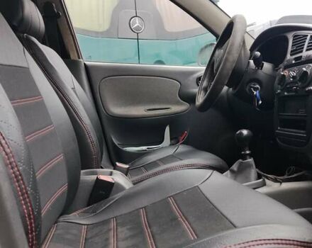 Красный Дэу Ланос, объемом двигателя 1.5 л и пробегом 330 тыс. км за 1400 $, фото 6 на Automoto.ua