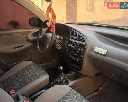 Красный Дэу Ланос, объемом двигателя 1.5 л и пробегом 205 тыс. км за 2200 $, фото 11 на Automoto.ua