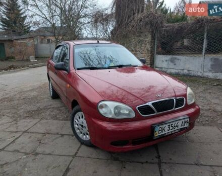 Красный Дэу Ланос, объемом двигателя 1.4 л и пробегом 156 тыс. км за 1950 $, фото 3 на Automoto.ua