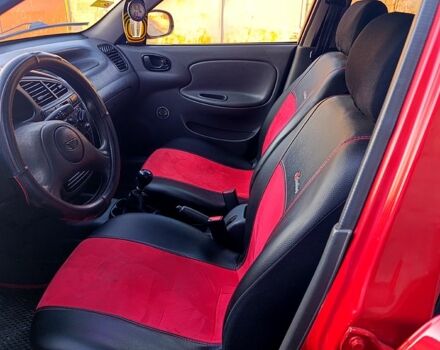 Красный Дэу Ланос, объемом двигателя 1.4 л и пробегом 130 тыс. км за 3300 $, фото 5 на Automoto.ua