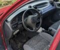 Красный Дэу Ланос, объемом двигателя 1.5 л и пробегом 180 тыс. км за 2000 $, фото 1 на Automoto.ua