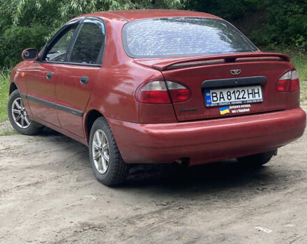 Красный Дэу Ланос, объемом двигателя 1.5 л и пробегом 212 тыс. км за 2250 $, фото 1 на Automoto.ua