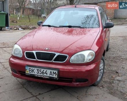 Красный Дэу Ланос, объемом двигателя 1.4 л и пробегом 156 тыс. км за 1950 $, фото 2 на Automoto.ua