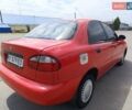 Красный Дэу Ланос, объемом двигателя 1.5 л и пробегом 155 тыс. км за 2297 $, фото 4 на Automoto.ua