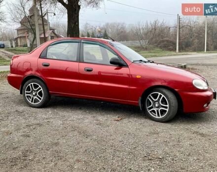 Красный Дэу Ланос, объемом двигателя 1.4 л и пробегом 103 тыс. км за 2700 $, фото 2 на Automoto.ua
