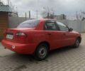 Красный Дэу Ланос, объемом двигателя 1.4 л и пробегом 73 тыс. км за 1750 $, фото 4 на Automoto.ua