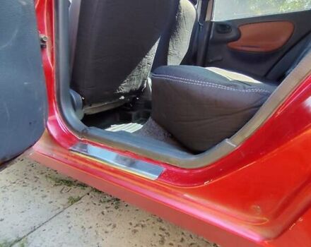 Деу Ланос 2008 у Полтаві на Automoto.ua Червоний Деу Ланос, об'ємом двигуна 1.5 л та пробігом 118 тис. км за 2950 $, фото 6 на Automoto.ua