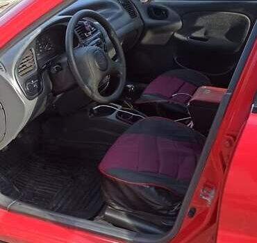 Красный Дэу Ланос, объемом двигателя 1.5 л и пробегом 437 тыс. км за 2150 $, фото 6 на Automoto.ua