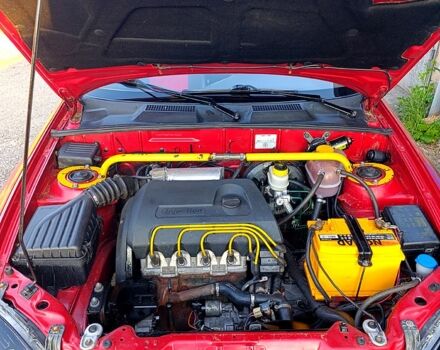 Красный Дэу Ланос, объемом двигателя 1.4 л и пробегом 130 тыс. км за 3300 $, фото 4 на Automoto.ua