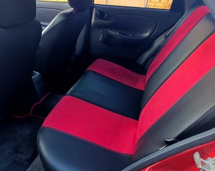 Красный Дэу Ланос, объемом двигателя 1.4 л и пробегом 130 тыс. км за 3300 $, фото 6 на Automoto.ua