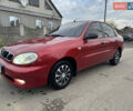 Красный Дэу Ланос, объемом двигателя 1.4 л и пробегом 44 тыс. км за 3300 $, фото 1 на Automoto.ua