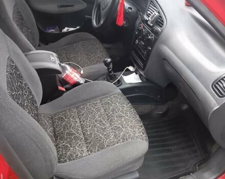 Красный Дэу Ланос, объемом двигателя 1.5 л и пробегом 210 тыс. км за 1800 $, фото 6 на Automoto.ua