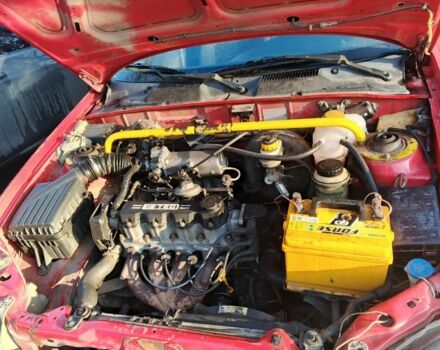 Красный Дэу Ланос, объемом двигателя 1.5 л и пробегом 100 тыс. км за 1500 $, фото 8 на Automoto.ua