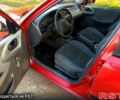 Красный Дэу Ланос, объемом двигателя 1.4 л и пробегом 298 тыс. км за 1399 $, фото 4 на Automoto.ua