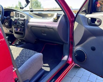 Красный Дэу Ланос, объемом двигателя 1.4 л и пробегом 112 тыс. км за 3000 $, фото 6 на Automoto.ua